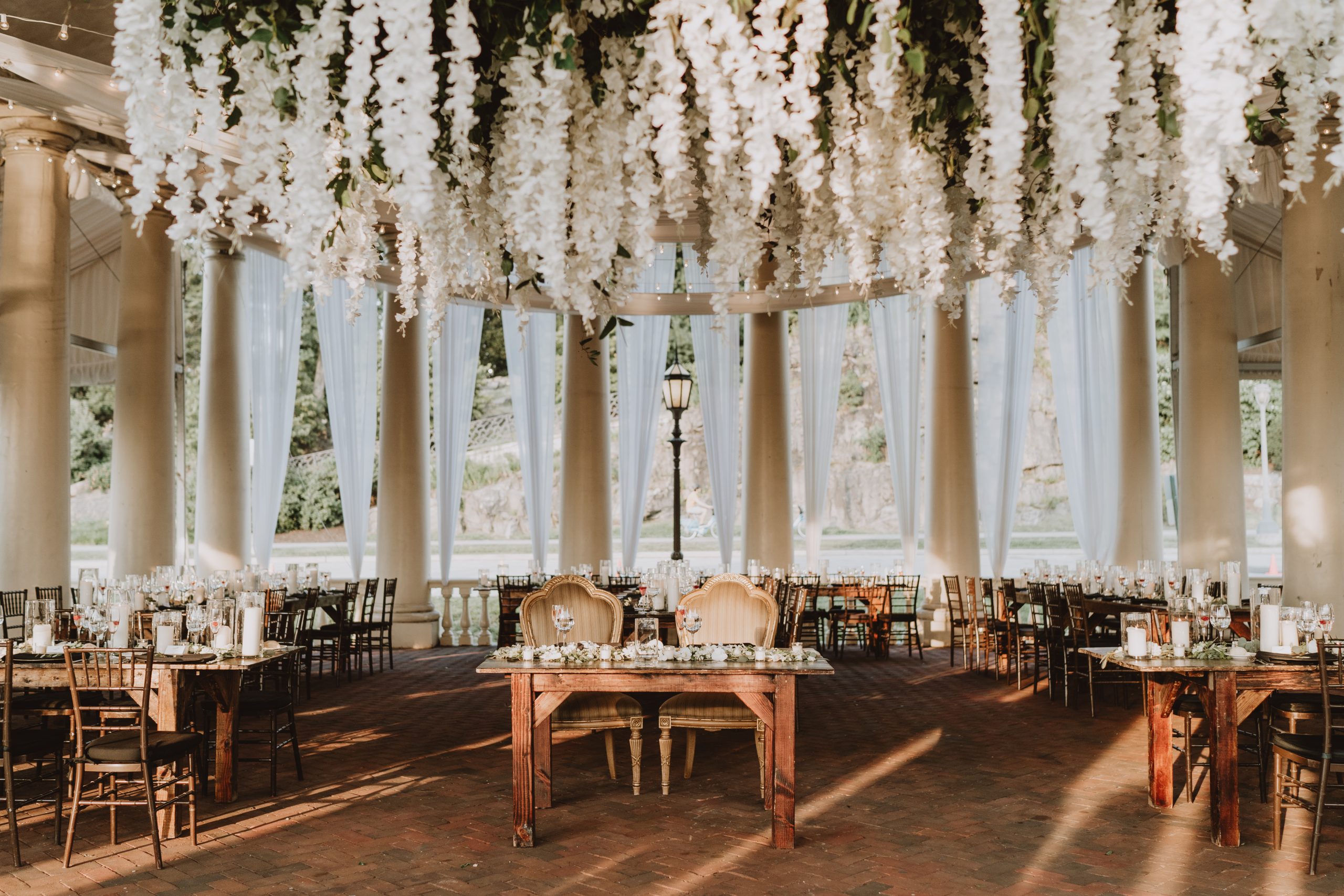 A riverside wedding reception arranged beneath the Water Works pavilion