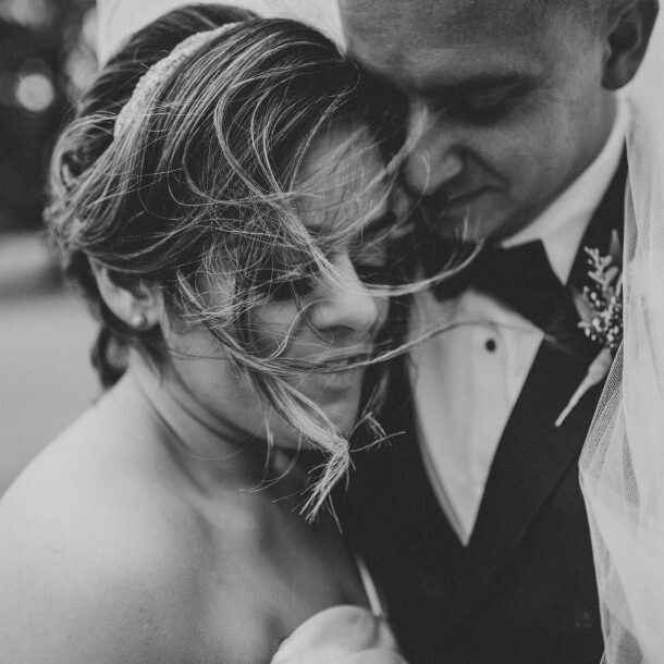 Nikita and Stephen smiling together on their wedding day