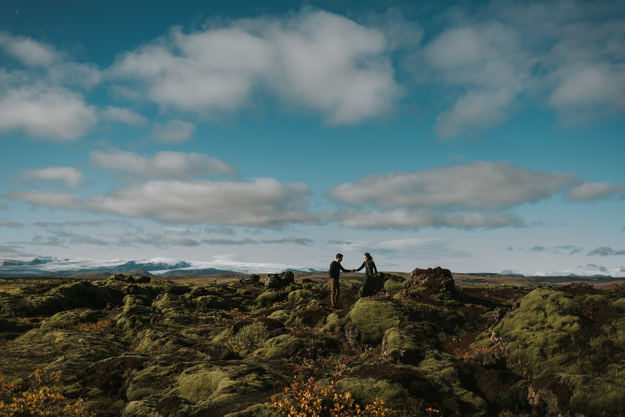 A couple exploring together during an engagement session