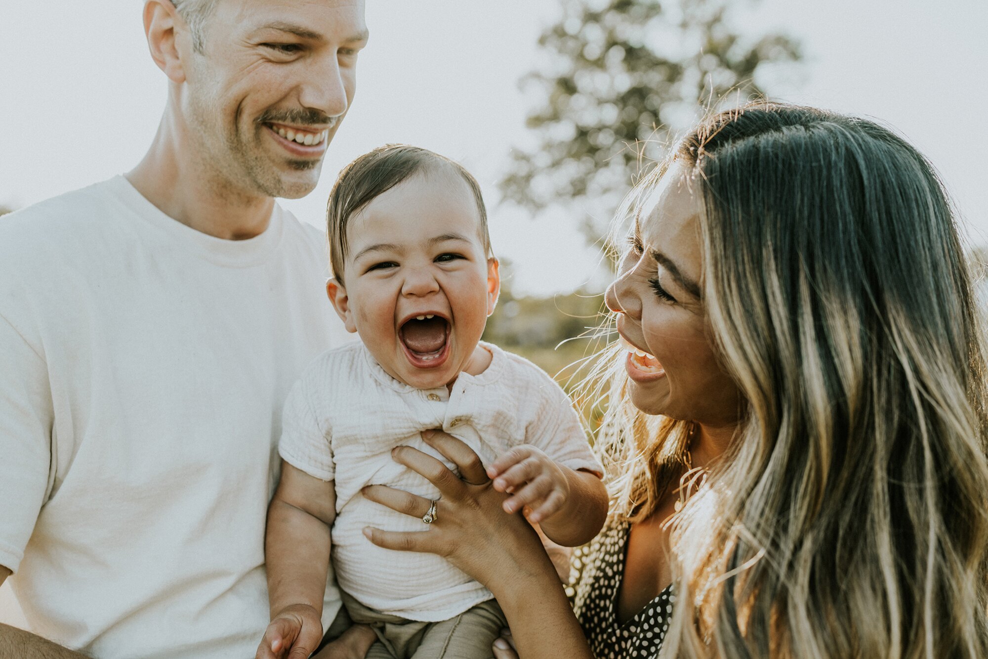 A family portrait photographed by M2 Photography