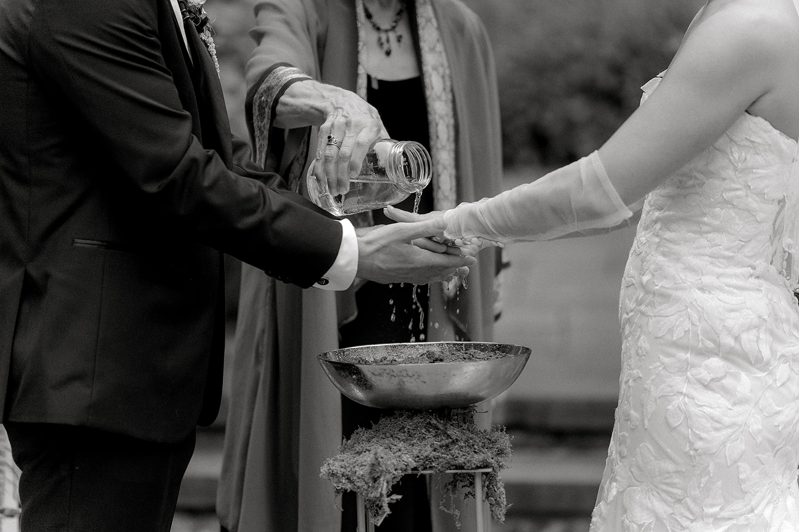 Audrey and Dan sharing a water and earth ritual