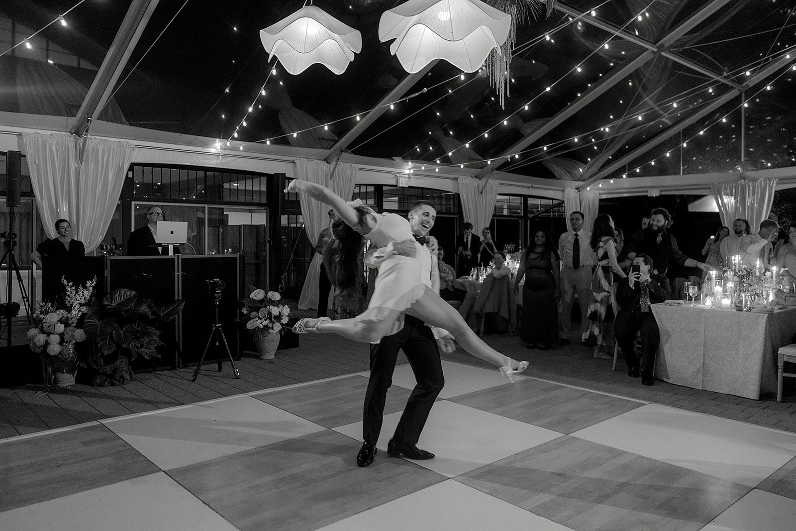 Dan lifting Audrey on the dance floor